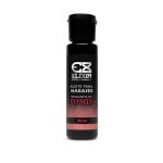 Botella de 30ml del aceite para masajes Elixir con aroma a rosas y extractos naturales estimulantes.